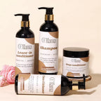 Eliama haircare set with shampoo, leave-in conditioner, deep conditioner, and conditioner bottles on beige background