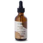 Amber glass bottle of Eliama hair growth serum with black dropper, anti hair loss scalp and edge oil